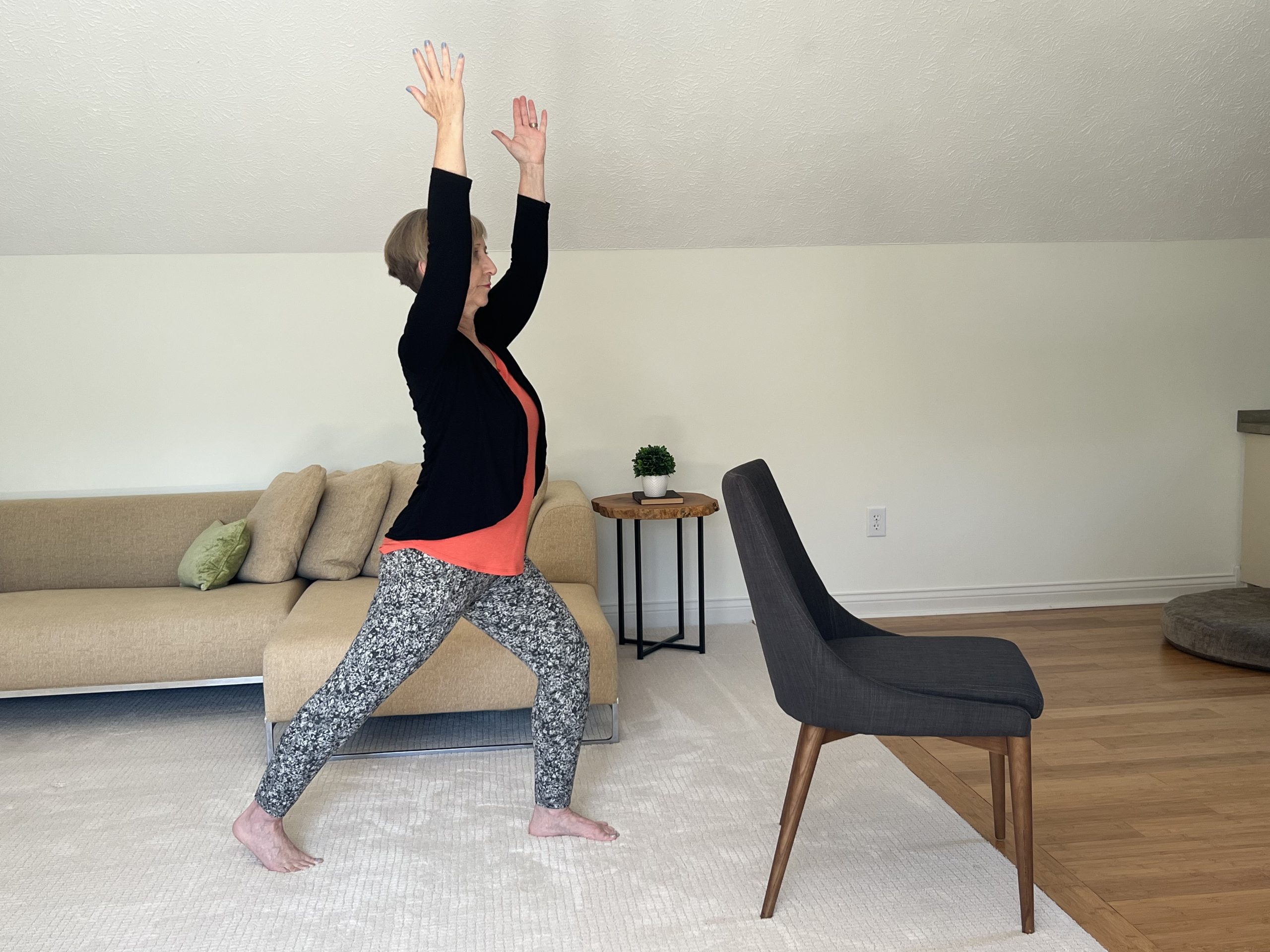 Warrior 1 pose demonstration by Heather Skoll